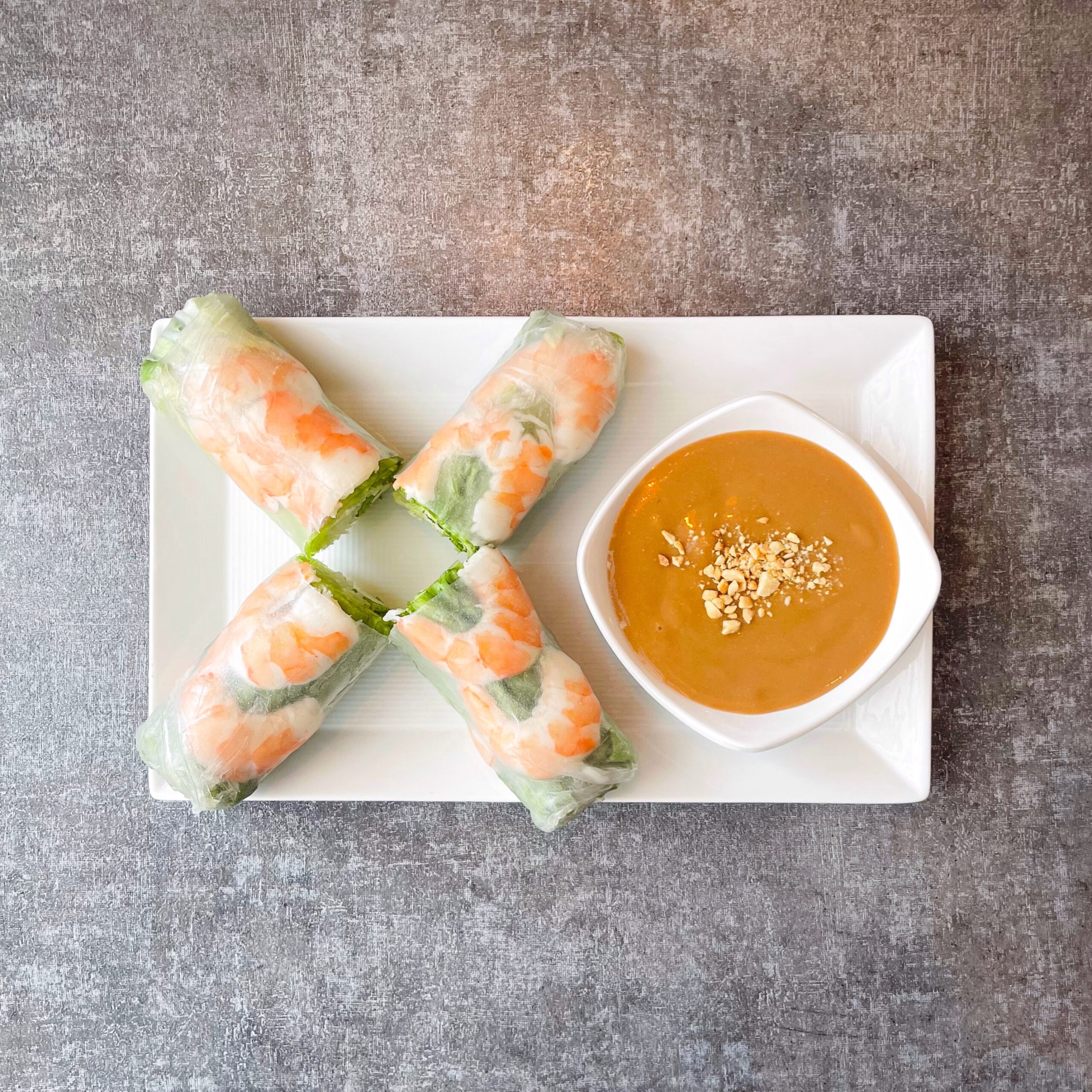 Shrimp, vermicelli & vegetables wrapped in rice paper and served with house-special sauce